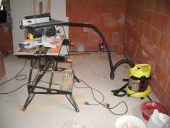 Another recent aquisition - a Karcher heavy duty vacuum cleaner, here being used to collect the sawdust from the saw.