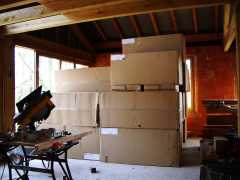 On Tuesday 13 March the hemp insulation arrived from Castillon - the whole living area was filled with the cardboard boxes of semi rigid panels.